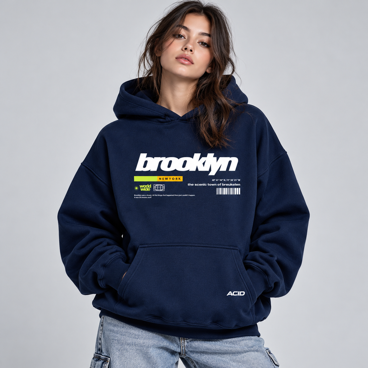 Female model wearing Brooklyn navy graphic oversized streetwear hoodie