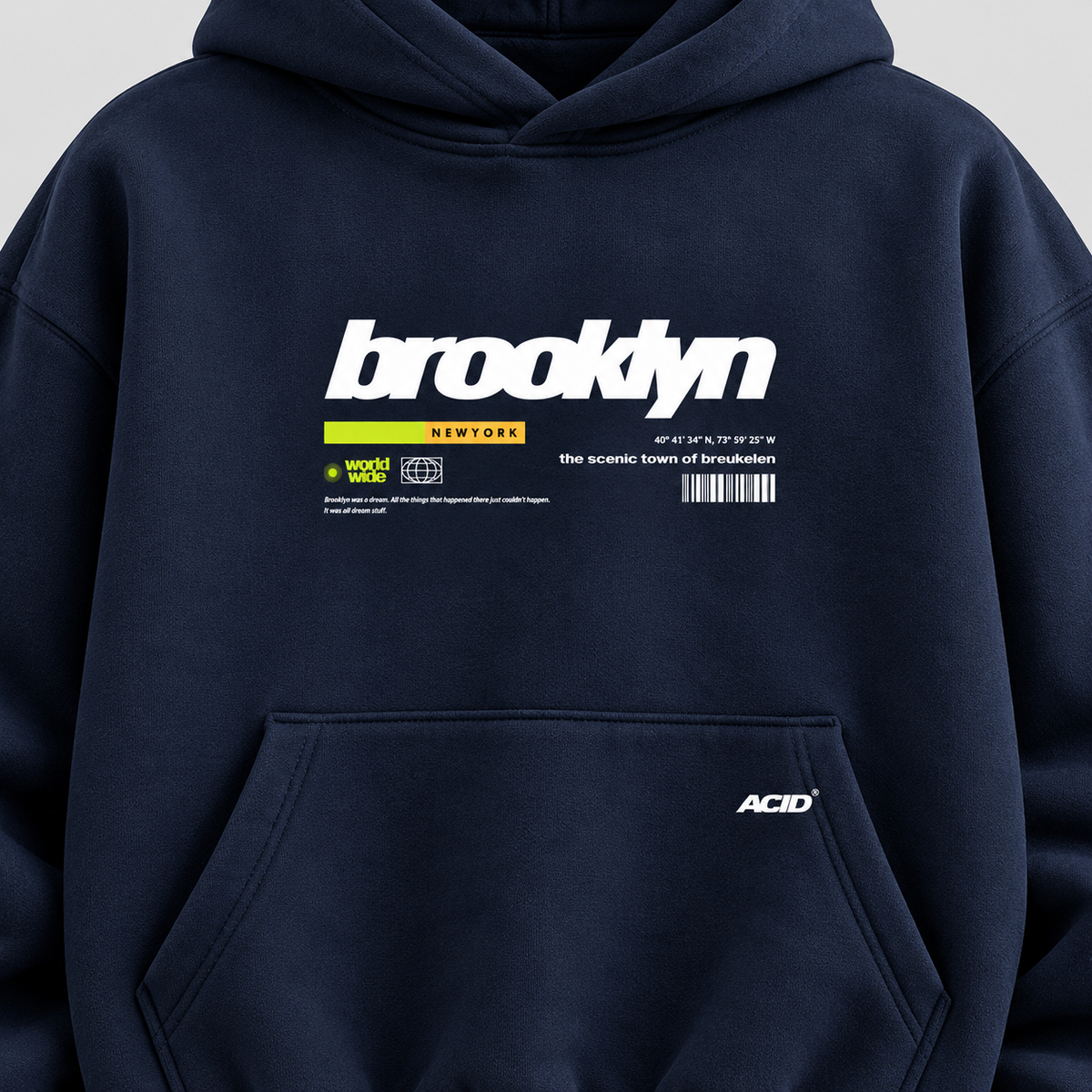 Close-up of white Brooklyn typography neon yellow New York print on 390+ GSM navy hoodie