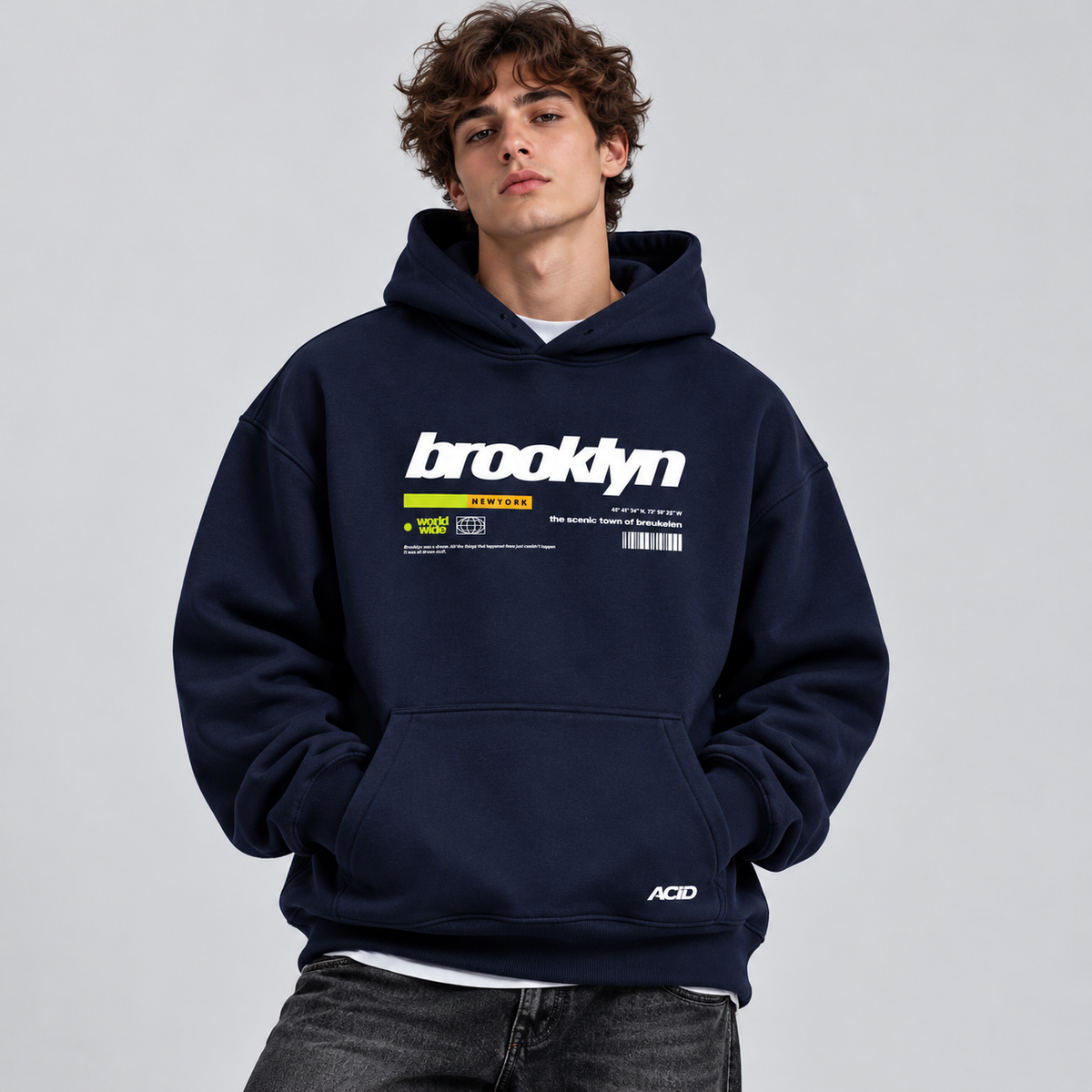 Male model wearing Brooklyn graphic navy heavyweight oversized unisex hoodie