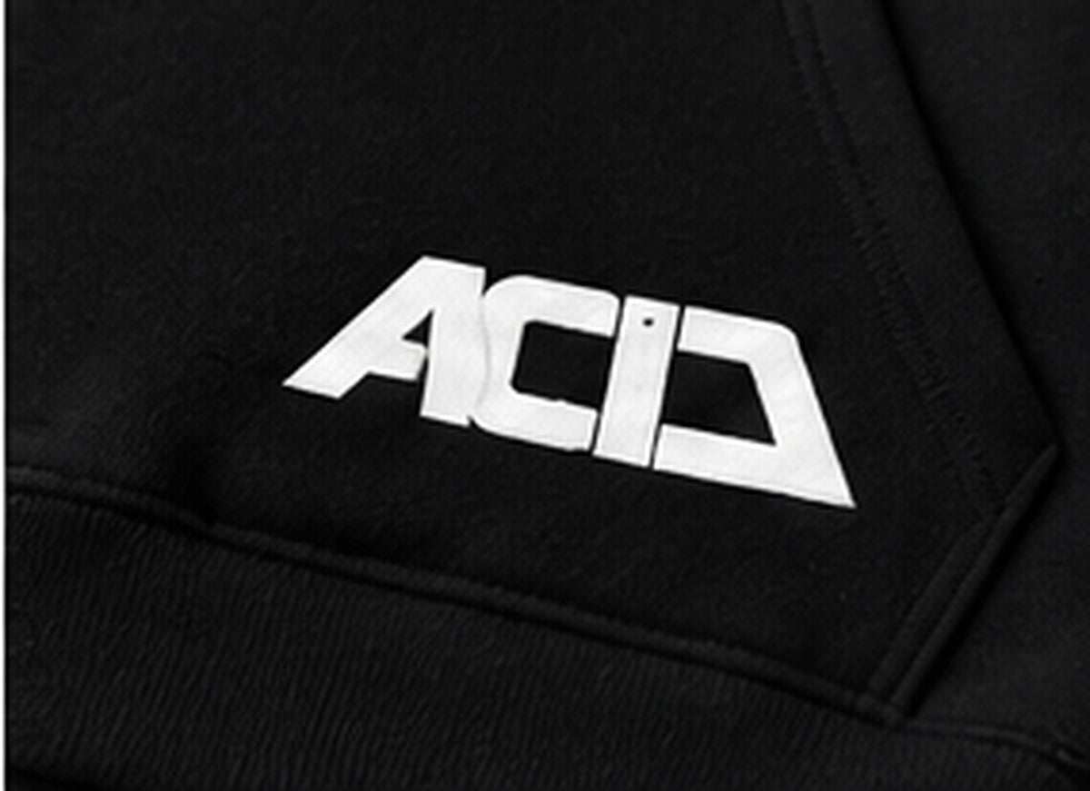 Acid House black 390+ GSM oversized unisex hoodie – pocket logo closeup view