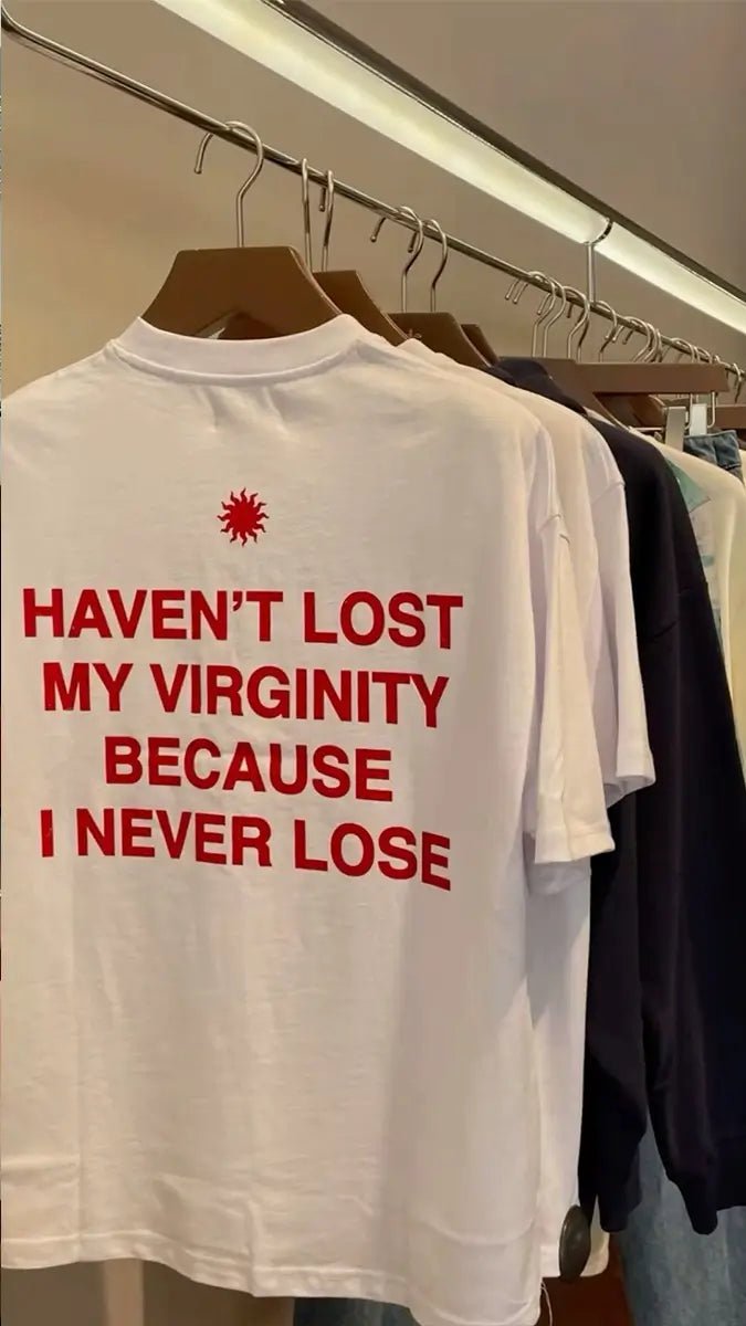 Trendy Women’s White Graphic Tee – “Haven’t Lost My Virginity Because I Never Lose” Funny Statement Shirt - Acid House™
